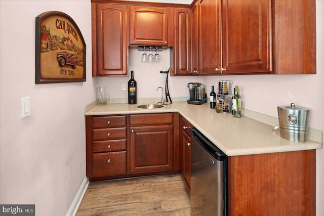 bar featuring sink and fridge