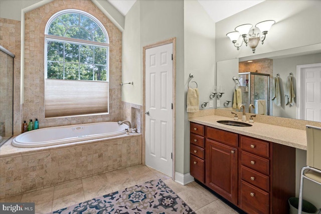 bathroom with vaulted ceiling, independent shower and bath, and vanity