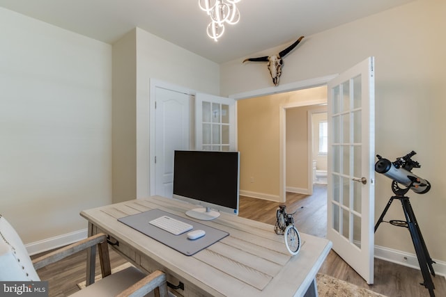 office area featuring french doors and hardwood / wood-style floors