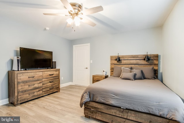 bedroom featuring ceiling fan and light wood-type flooring