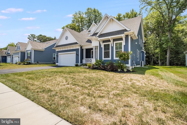 view of front facade featuring a garage and a front yard