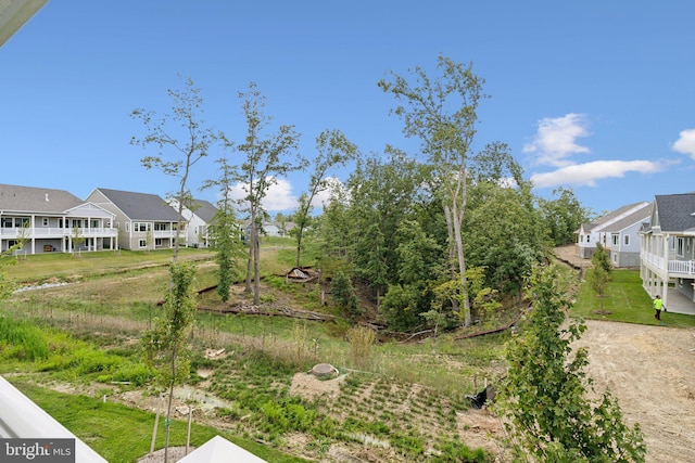 view of yard with a residential view