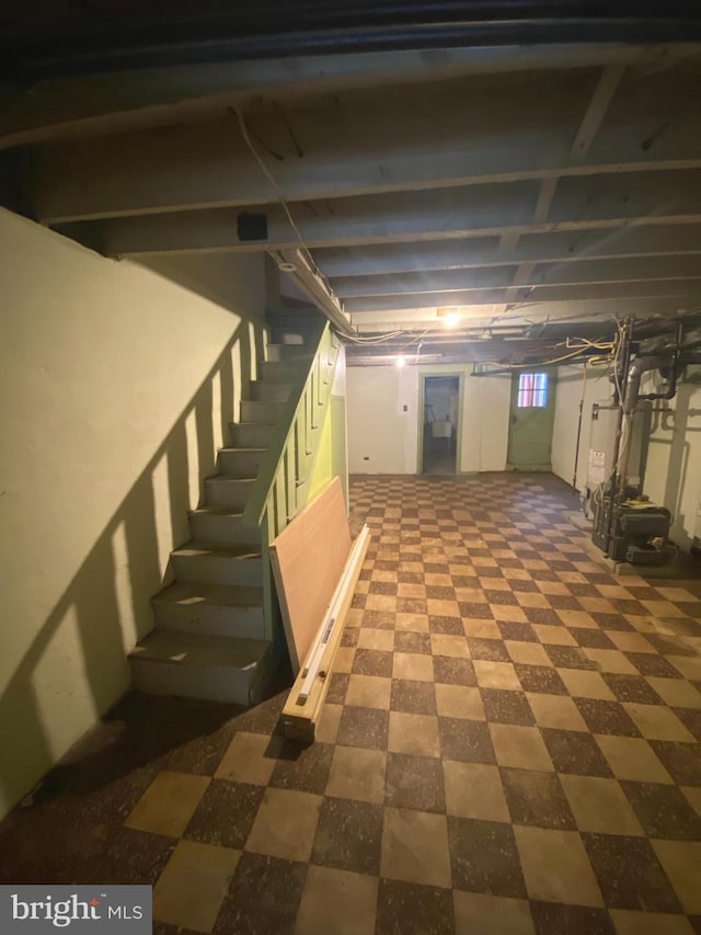 basement featuring tile patterned floors