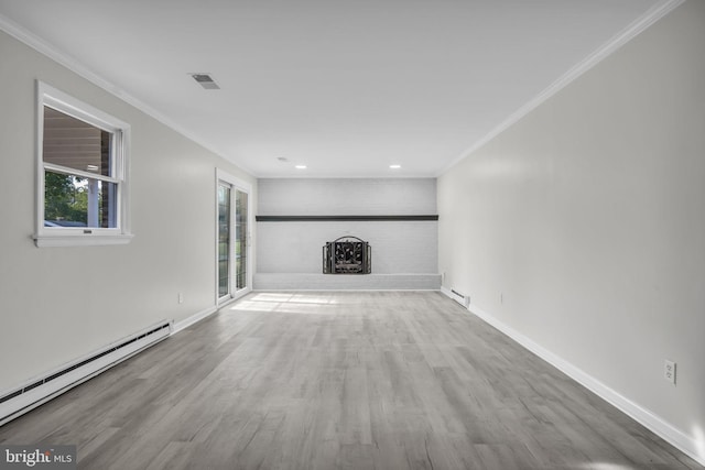 unfurnished living room featuring a baseboard radiator, a brick fireplace, light wood-type flooring, and crown molding