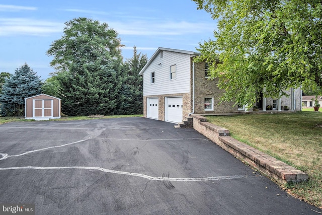 view of property exterior featuring a garage, a yard, and a shed