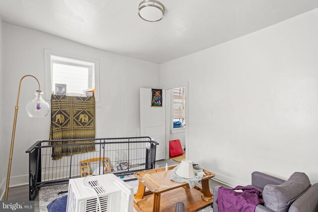 interior space with hardwood / wood-style flooring