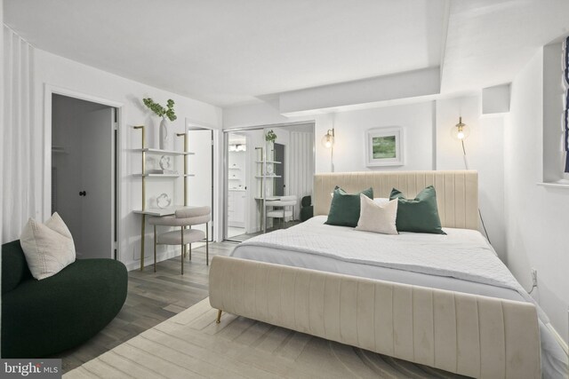 bedroom featuring a closet and hardwood / wood-style floors