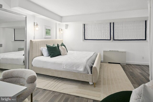 bedroom featuring hardwood / wood-style flooring