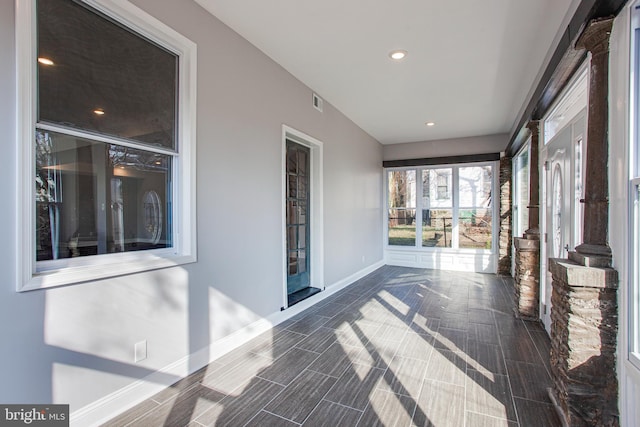 view of unfurnished sunroom