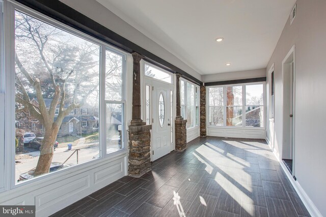 view of unfurnished sunroom