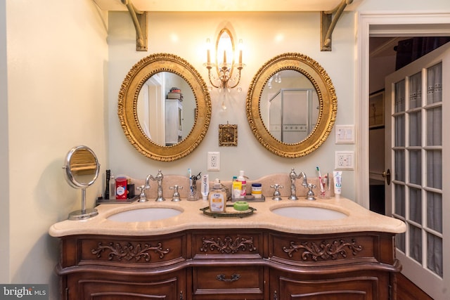 bathroom featuring double vanity