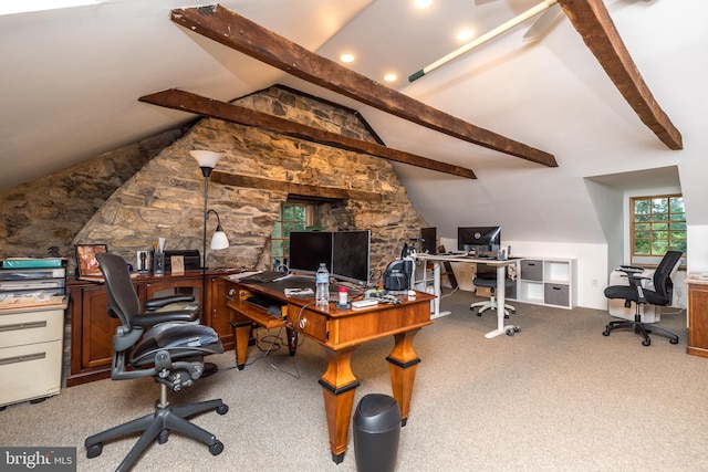 carpeted office featuring vaulted ceiling with beams