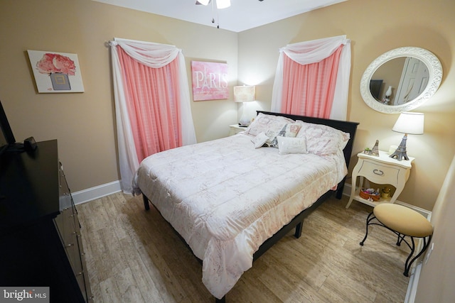 bedroom with wood-type flooring