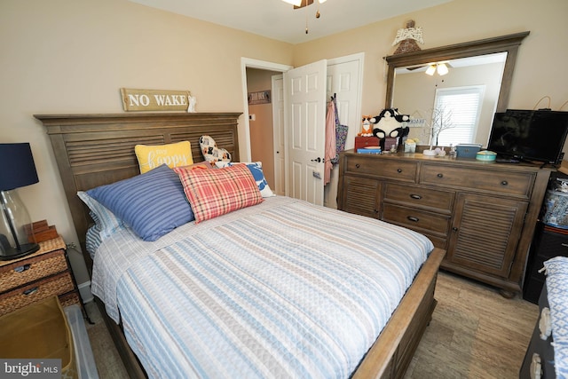 bedroom featuring wood finished floors