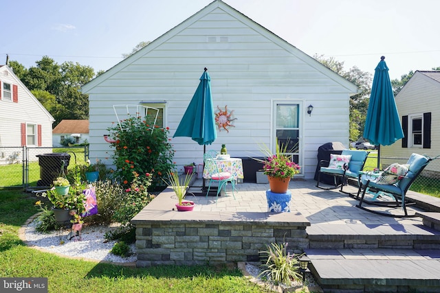 rear view of house featuring a patio area