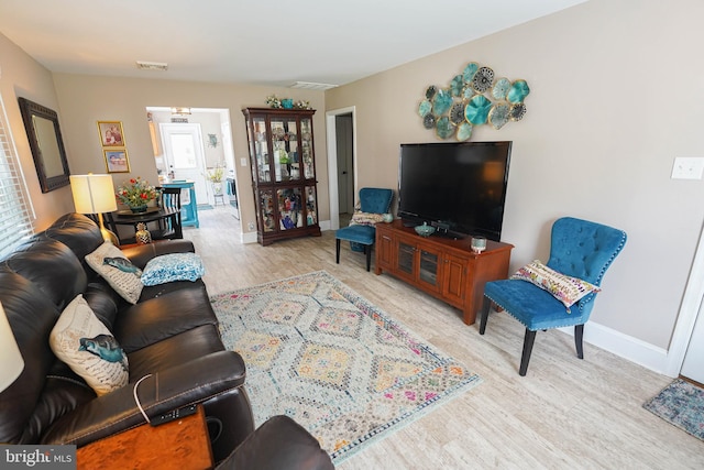 living room featuring light wood-type flooring