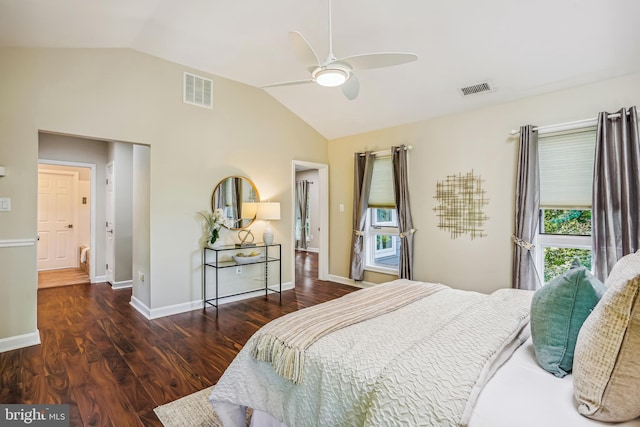 bedroom with lofted ceiling, ceiling fan, and dark hardwood / wood-style floors