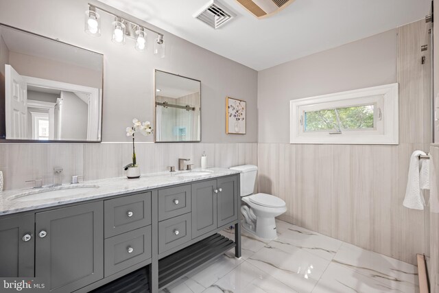 kitchen with white cabinets, backsplash, appliances with stainless steel finishes, and sink