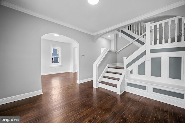 interior space with ornamental molding and wood-type flooring