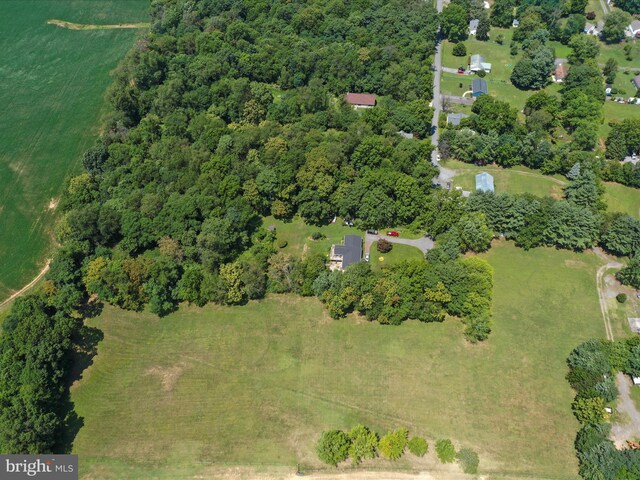 aerial view with a water view and a rural view