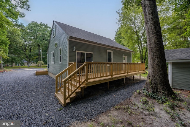 rear view of house with a deck