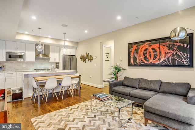 living room featuring dark hardwood / wood-style floors