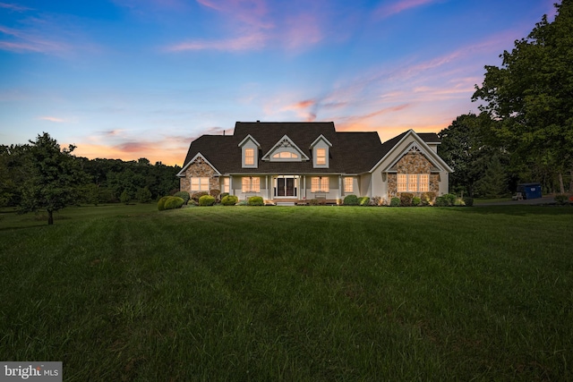 view of front of house featuring a yard