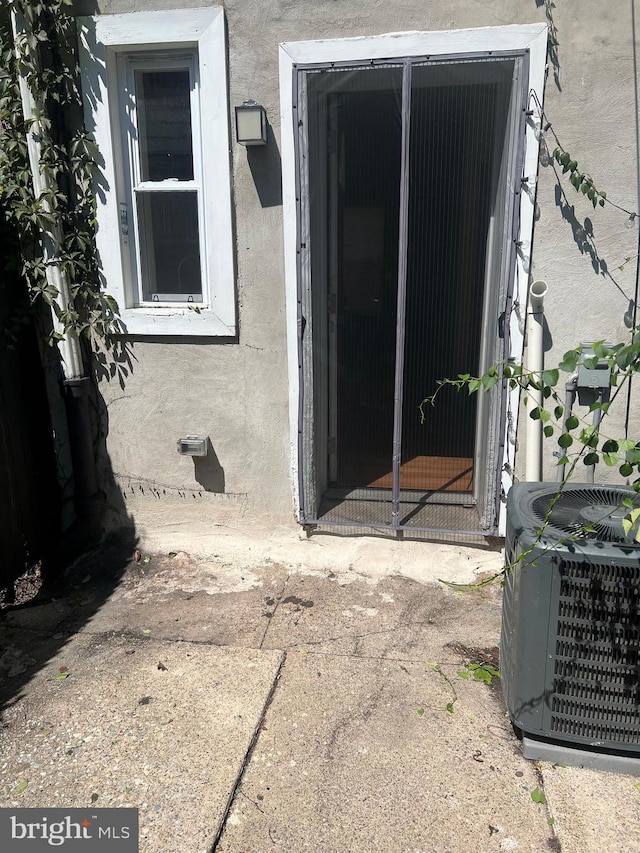 entrance to property with central air condition unit