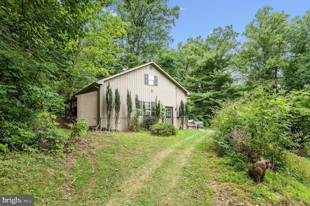 view of home's exterior featuring a yard