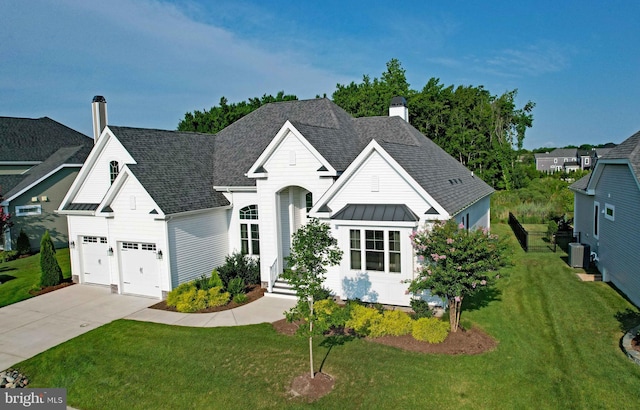 view of front facade with a front lawn and central AC unit