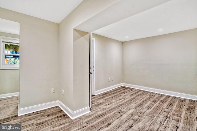 basement with wood-type flooring