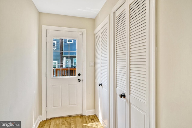 doorway featuring light hardwood / wood-style floors