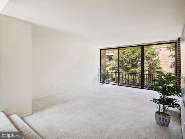 entryway with light tile patterned floors