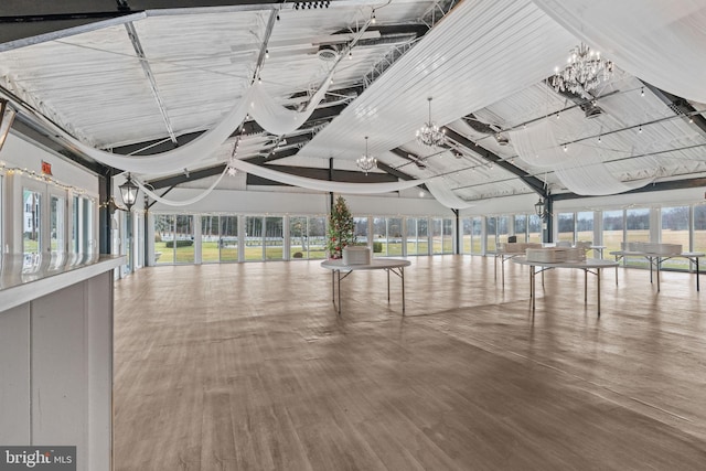 interior space with a notable chandelier and a wealth of natural light