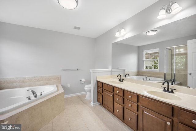 full bathroom with plus walk in shower, toilet, dual bowl vanity, and tile patterned flooring