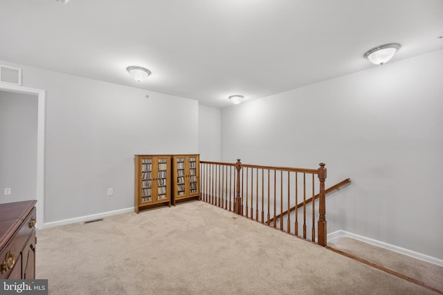 interior space with light colored carpet