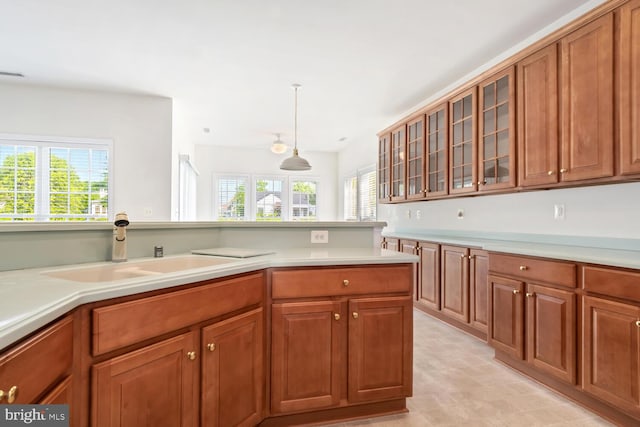 kitchen featuring pendant lighting and sink