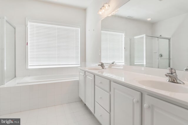 bathroom featuring vanity, separate shower and tub, and tile patterned flooring