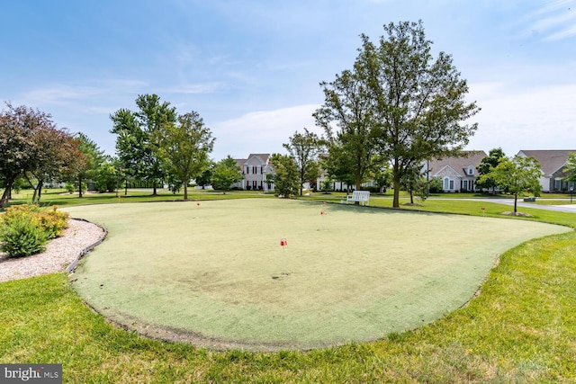 view of community featuring a lawn