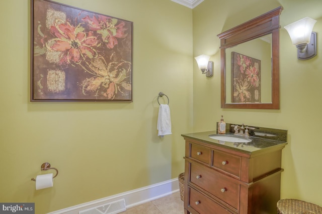 bathroom with tile patterned flooring and vanity