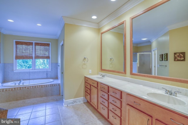 full bathroom featuring double vanity, ornamental molding, a sink, and tile patterned floors