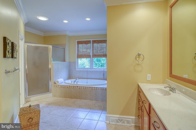 full bathroom with vanity, ornamental molding, a shower stall, a bath, and tile patterned floors