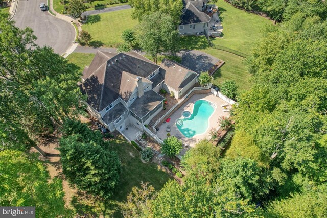 view of swimming pool featuring a patio and an in ground hot tub