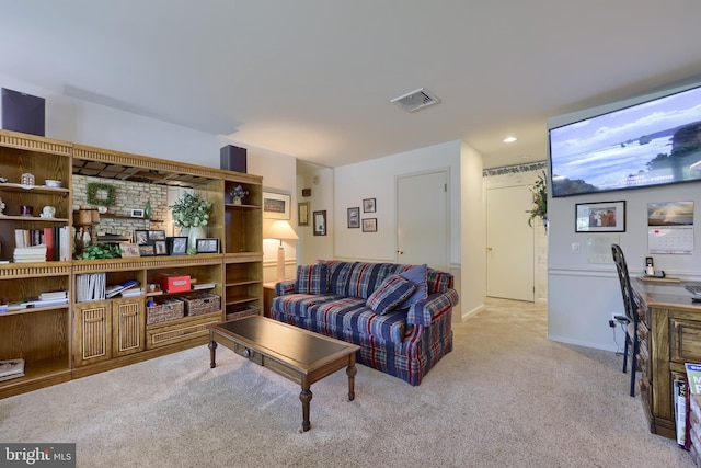 carpeted living room with recessed lighting, visible vents, and baseboards