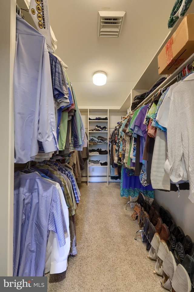 walk in closet with visible vents