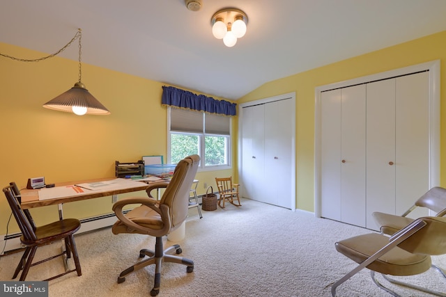 carpeted home office with lofted ceiling