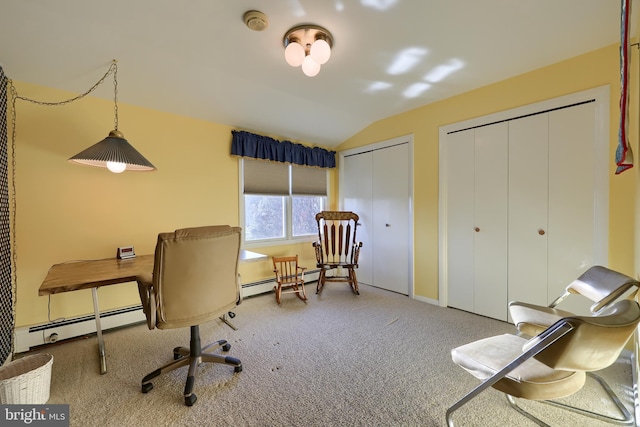 carpeted office space with lofted ceiling and baseboard heating