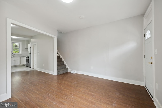 interior space with light wood-type flooring and sink