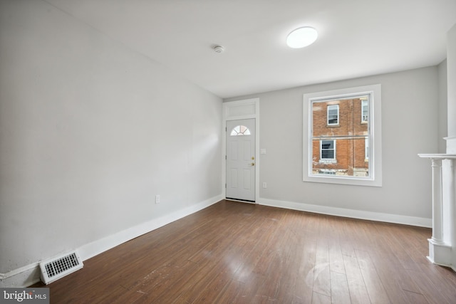 entryway with wood-type flooring