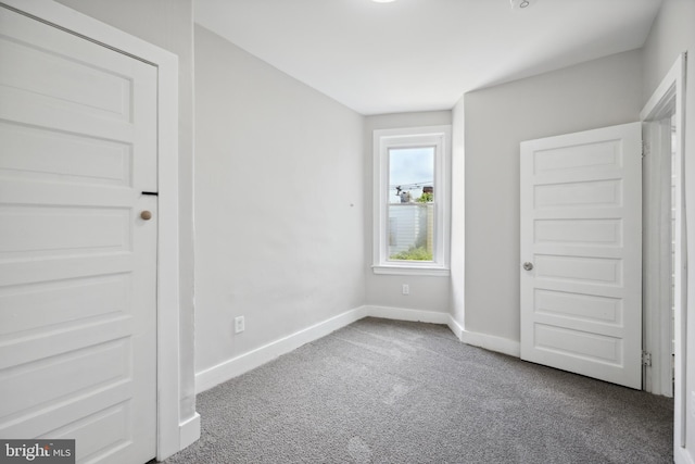 unfurnished bedroom featuring carpet floors